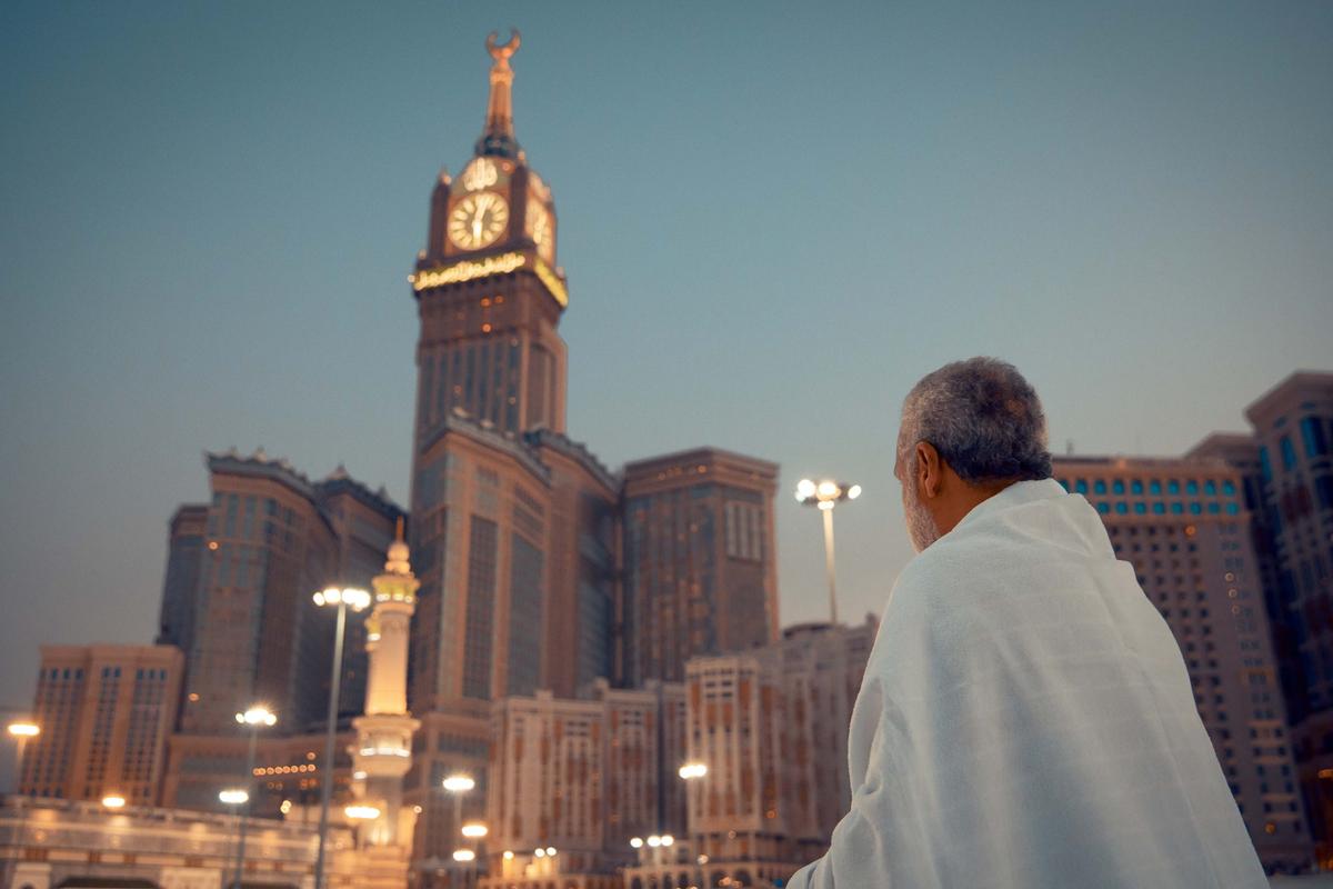 Pilgrim looking at Makkah Clock Tower